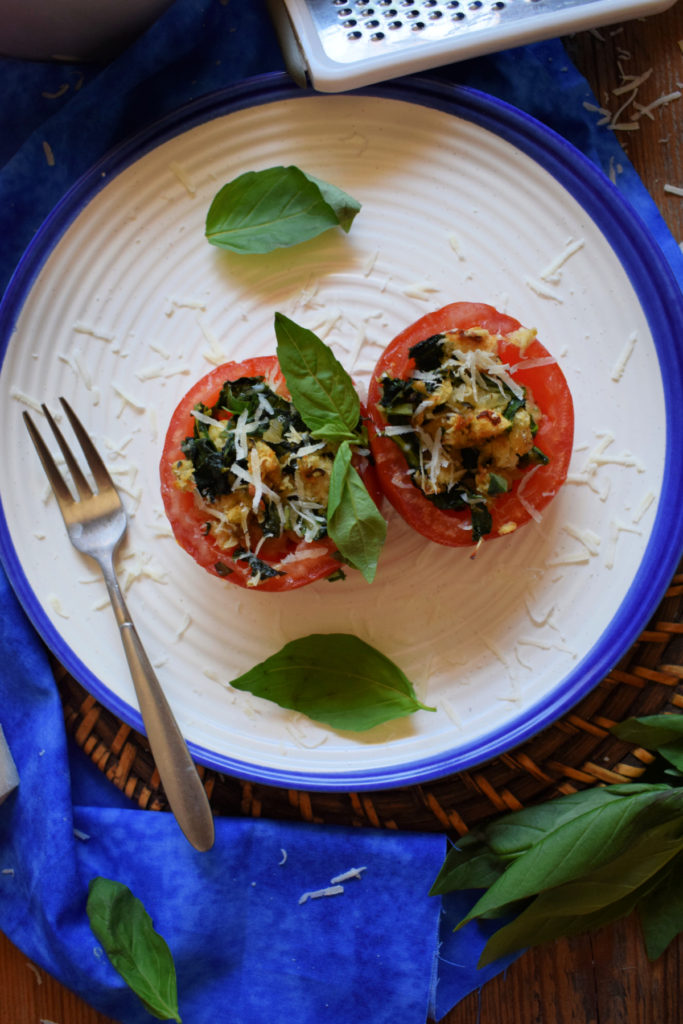 over head view of the spinach and herb stuffed tomatoes