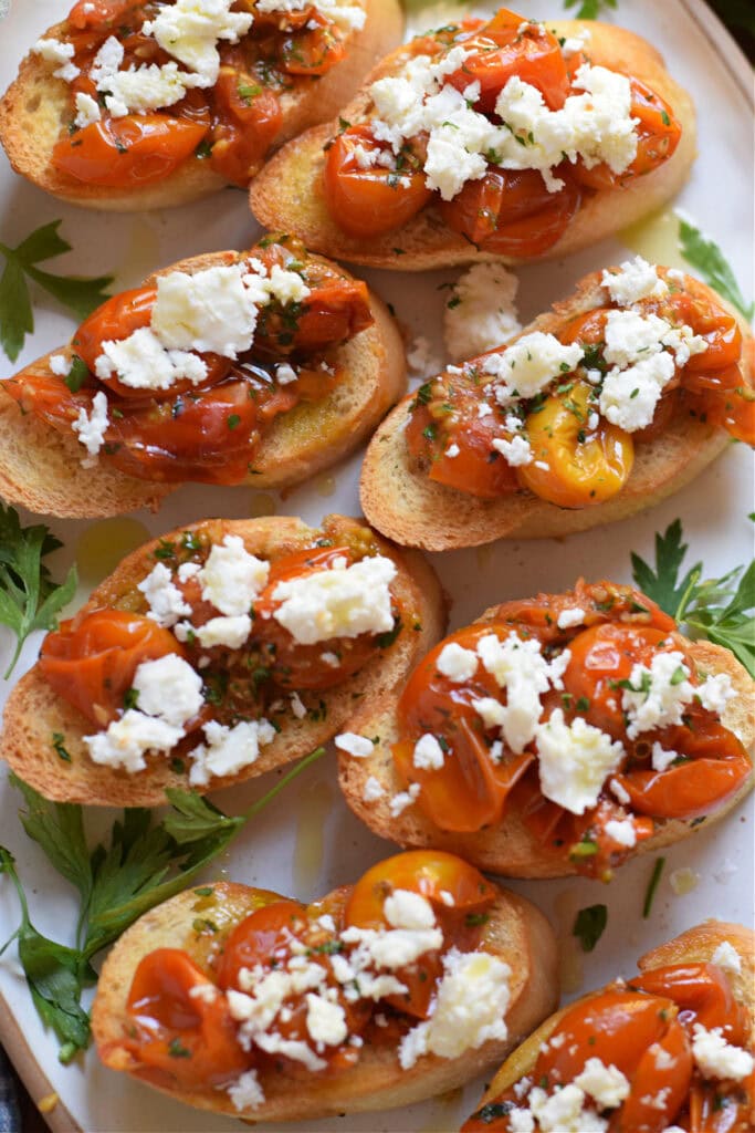 Tomato feta bruschetta on a tray.