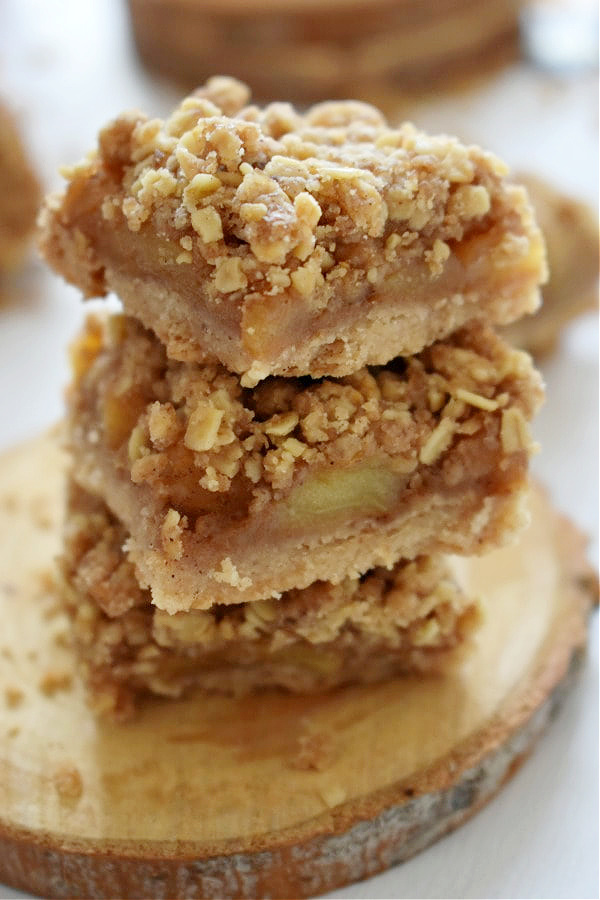 a stack of apple pie crumble bars