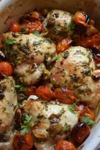 close up of baked green olive chicken