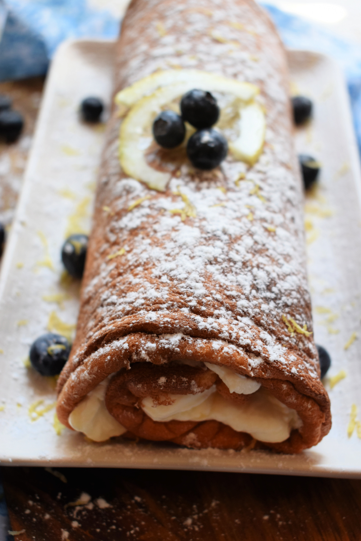 close up of the lemon blueberry swiss roll cake