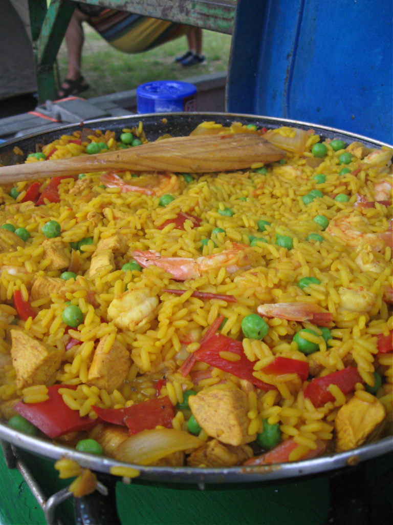 a cooked payella on a camp stove