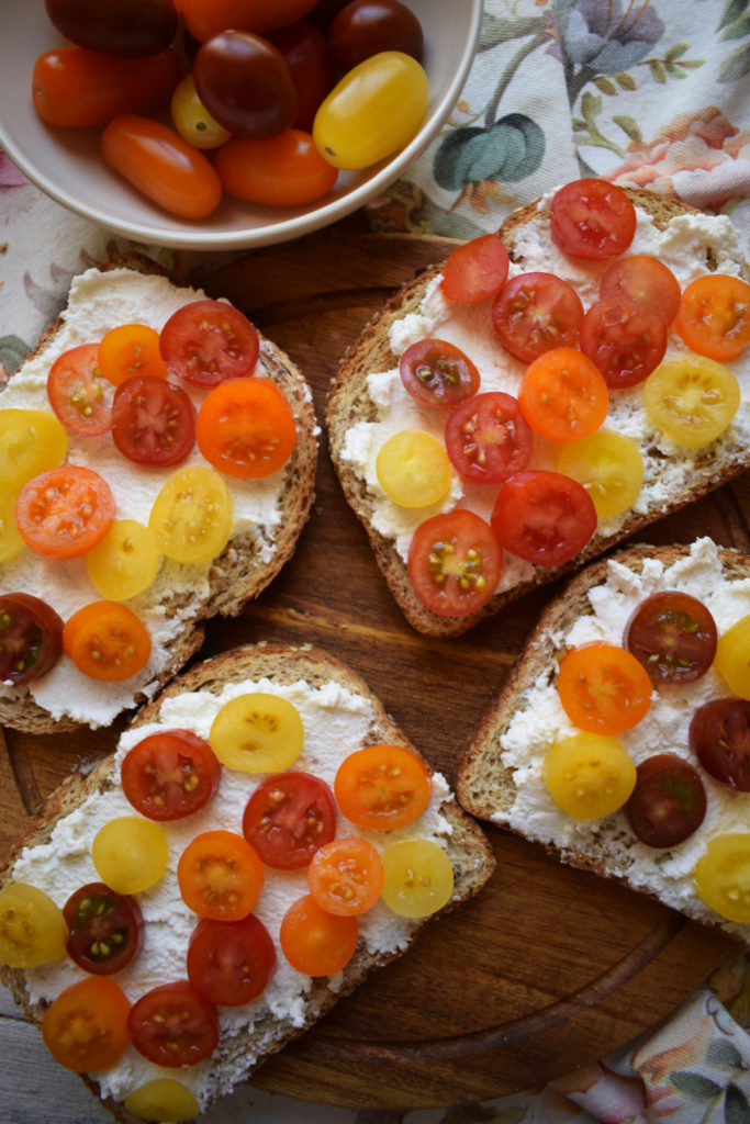 cherry tomatoes and ricotta cheese on toast