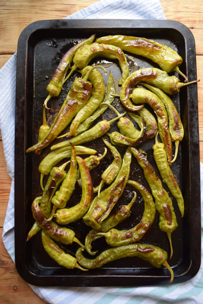 Oven Roasted Italian Green Peppers on a baking tray.