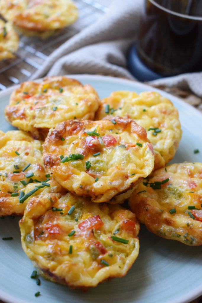 bell pepper and egg breakfast muffins on a plate