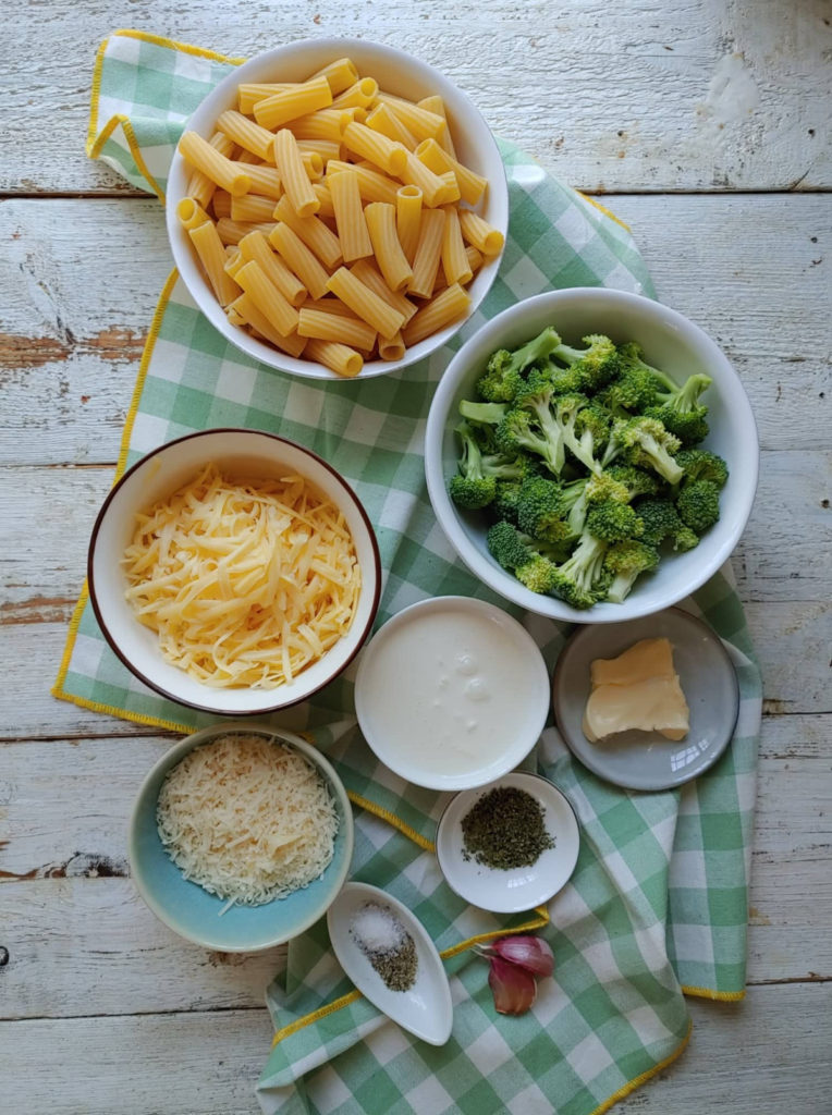 ingredients to make the penne pasta and broccoli bake