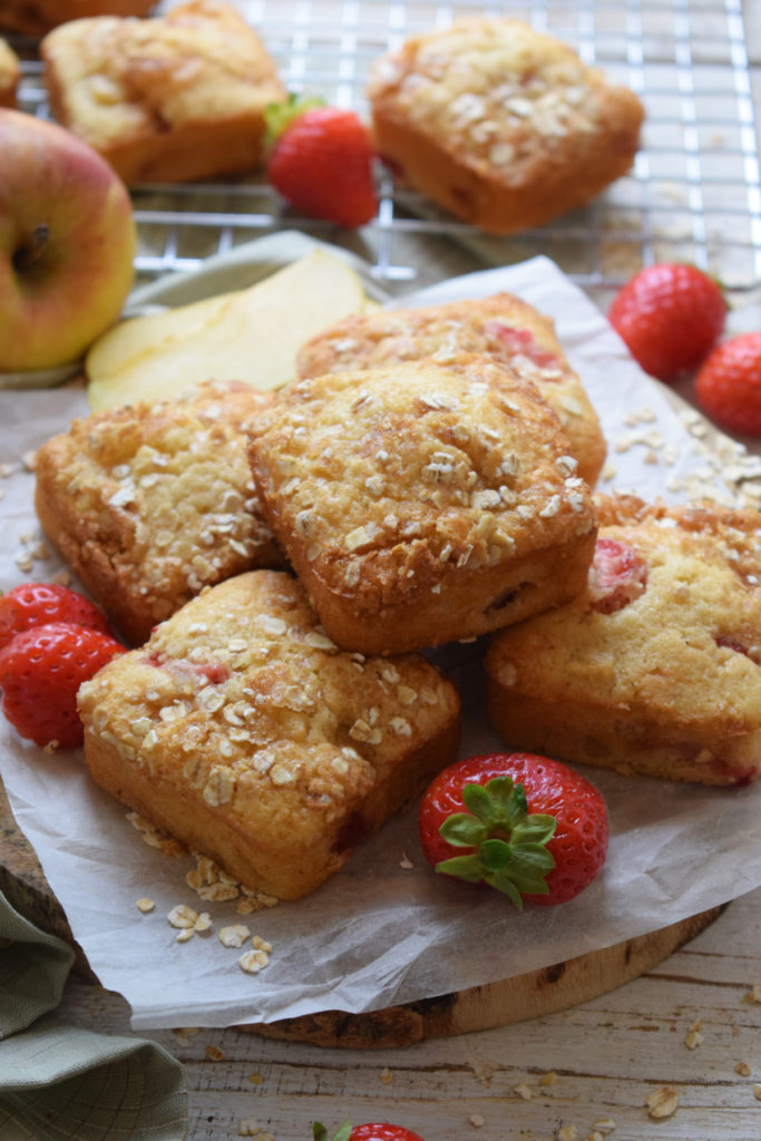 Muffins stacked with fresh strawberries