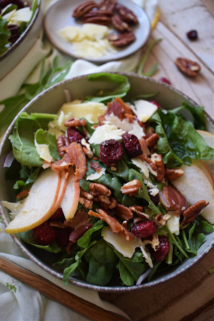 close up of the pear and pecan salad with dried cranberries