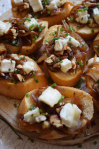 close up of the pecan and goat cheese bruschetta