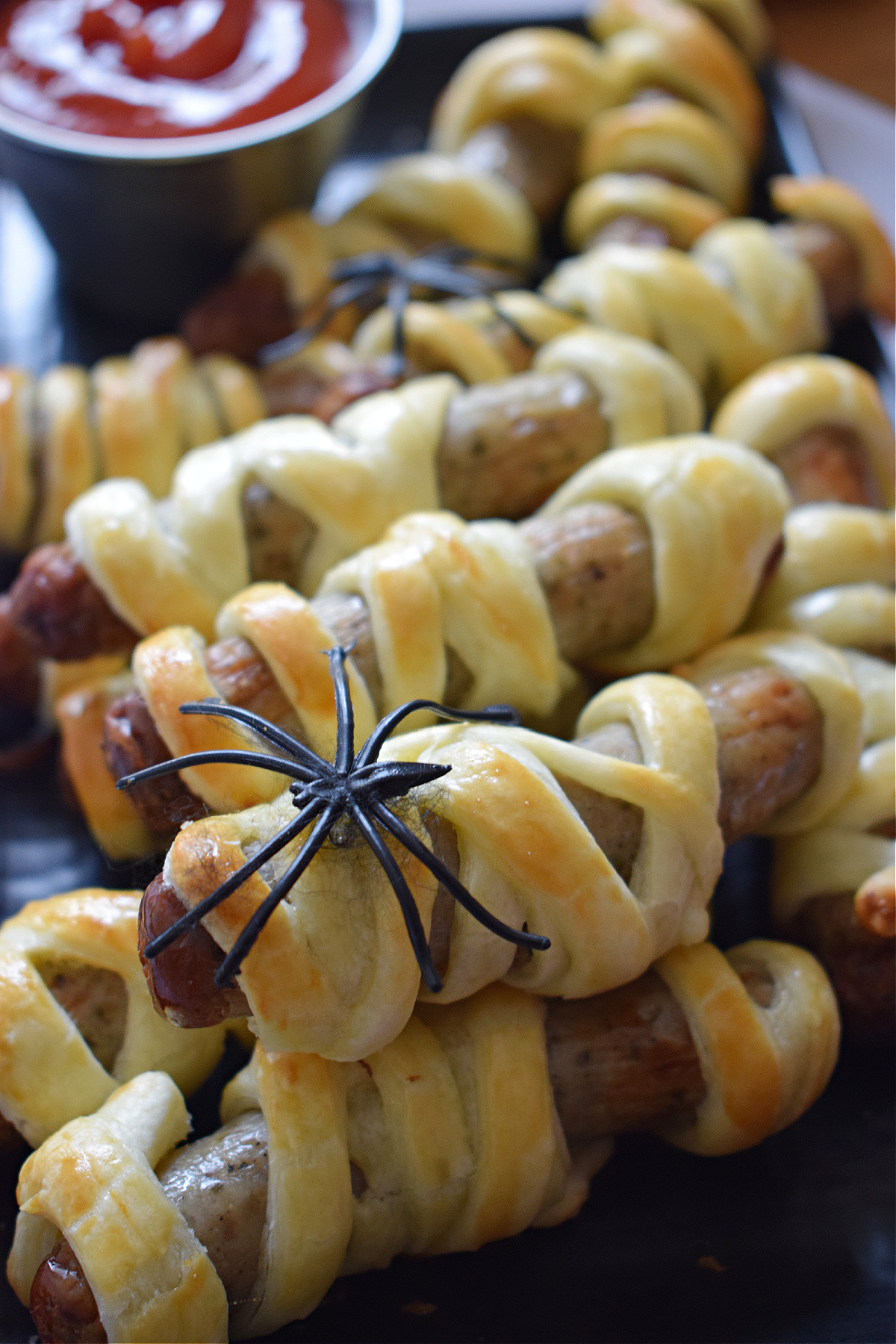 close up of the halloween mummy sausage rolls