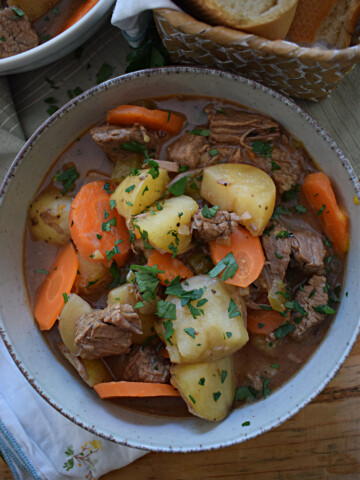 slow cooker beef and vegetable stew in a bowl
