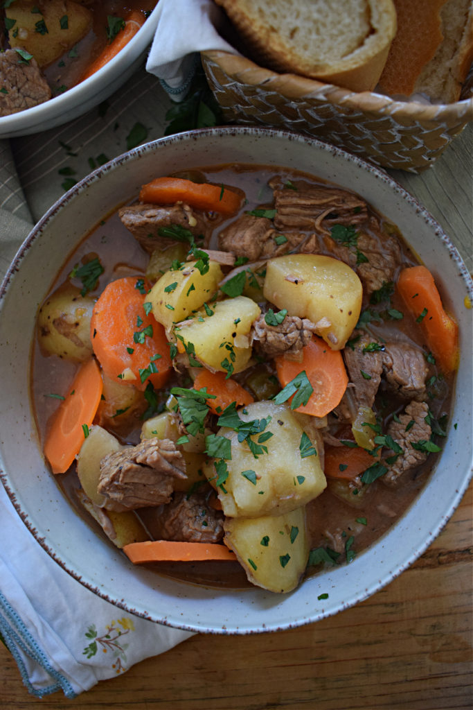 slow cooker beef and vegetable stew in a bowl