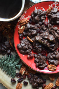 chocolate pecan clusters with a cup of coffee