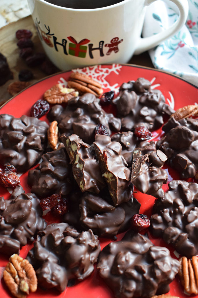 chocolate pecan clusters on a christmas plate