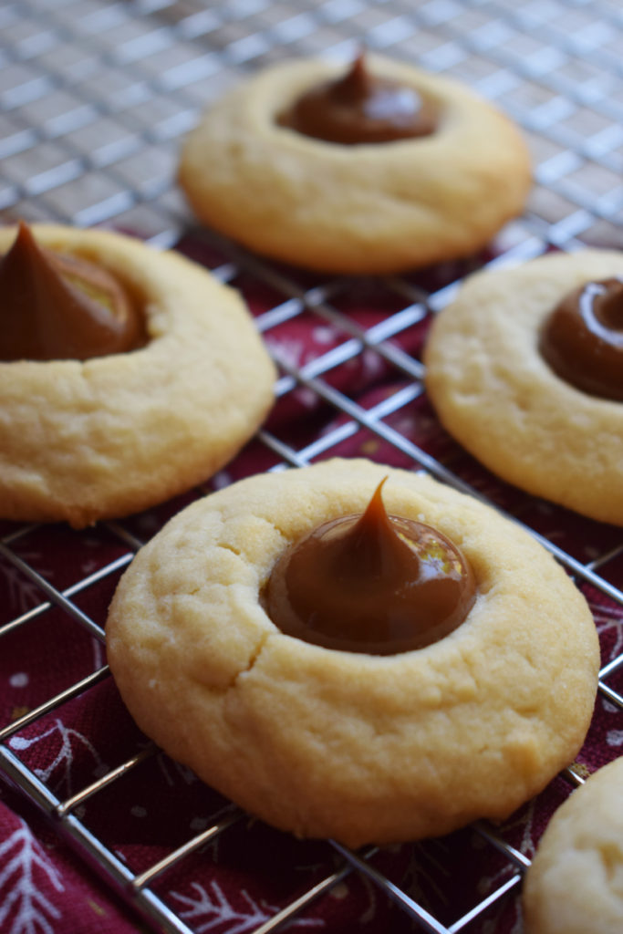 close up of the dulce de leche thumbprint cookies