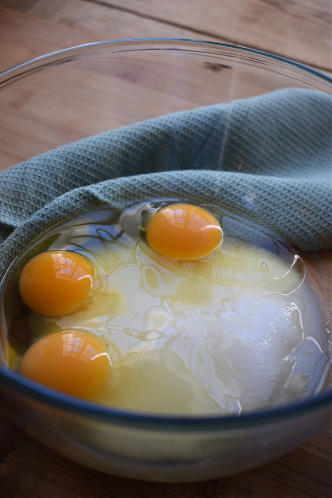eggs and sugar in a bowl to make brownies