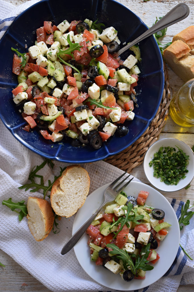 table setting of the greek style salad