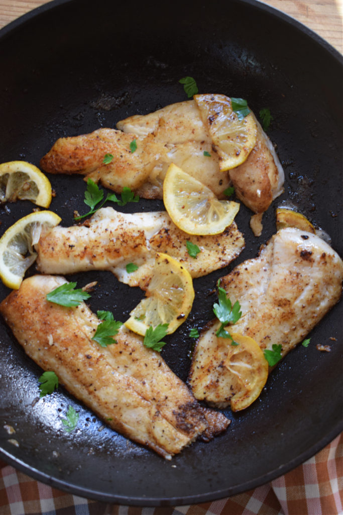 freshly cooked perch in a skillet