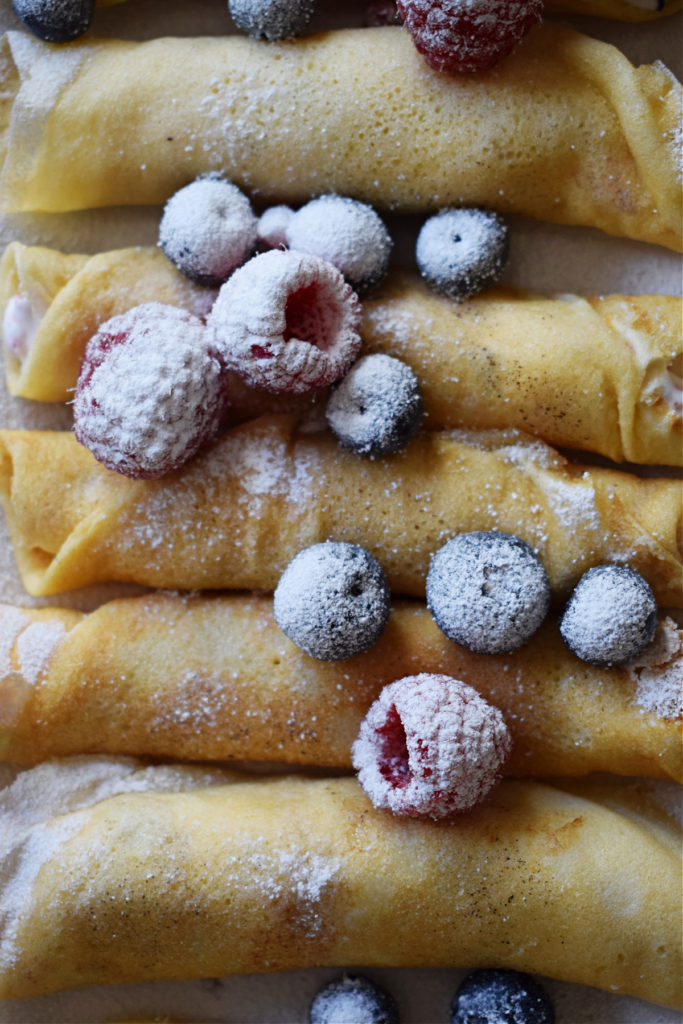 close up of the mini berry filled crepes