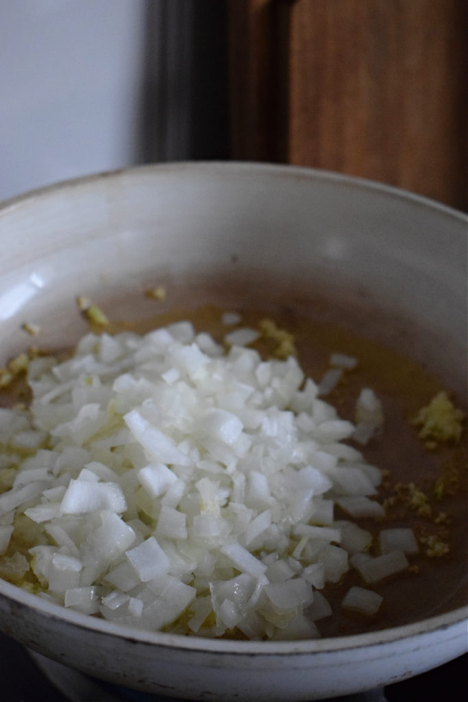Onion in a frying pan to make rice pilaf