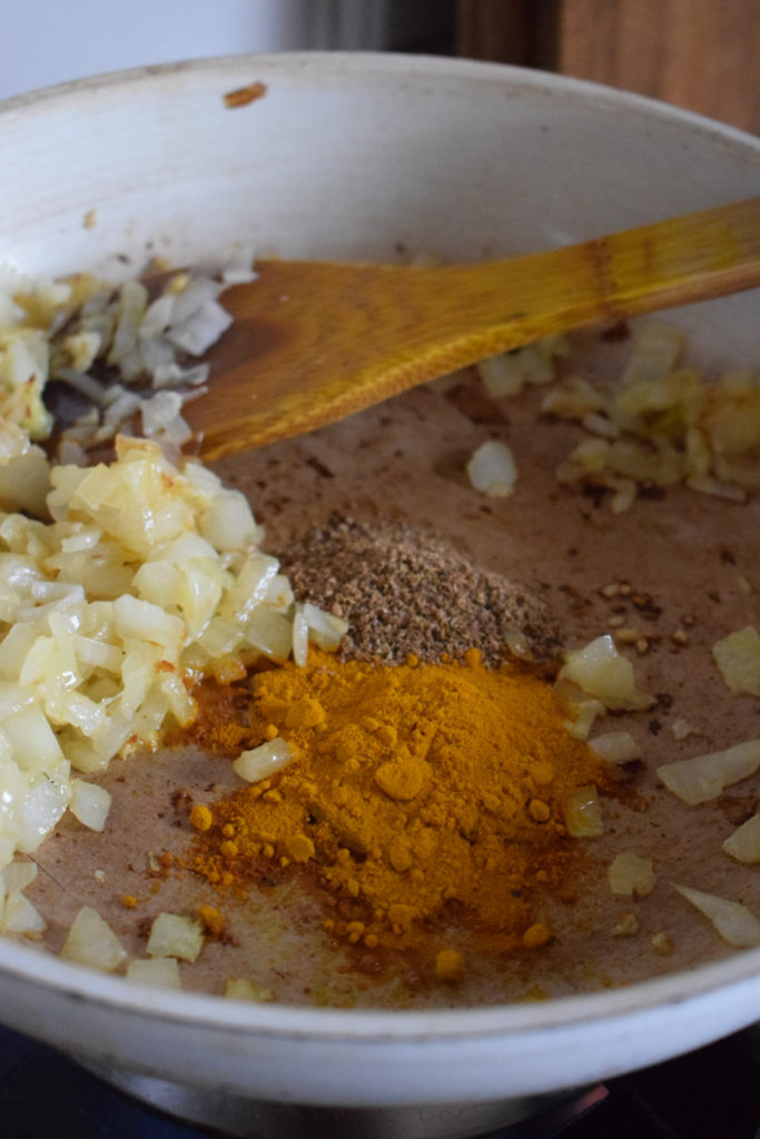 Frying dried spices with onions