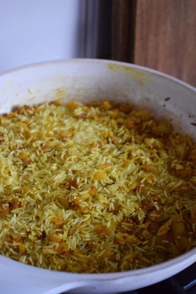 cooking Moroccan rice pilaf.