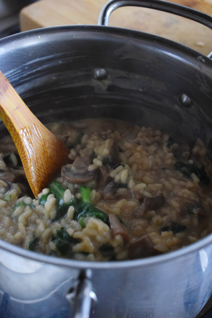 Cooked risotto in a skillet.