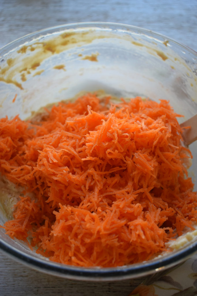 Shredded carrots added to cake batter.