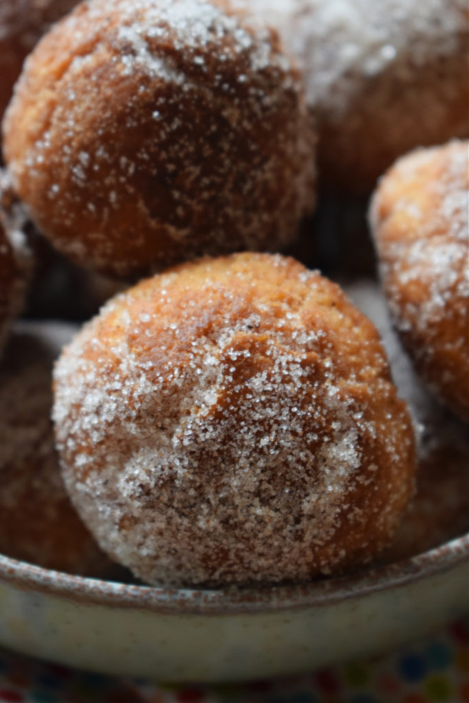 Close up of Mexican buñuelos in a bowl.