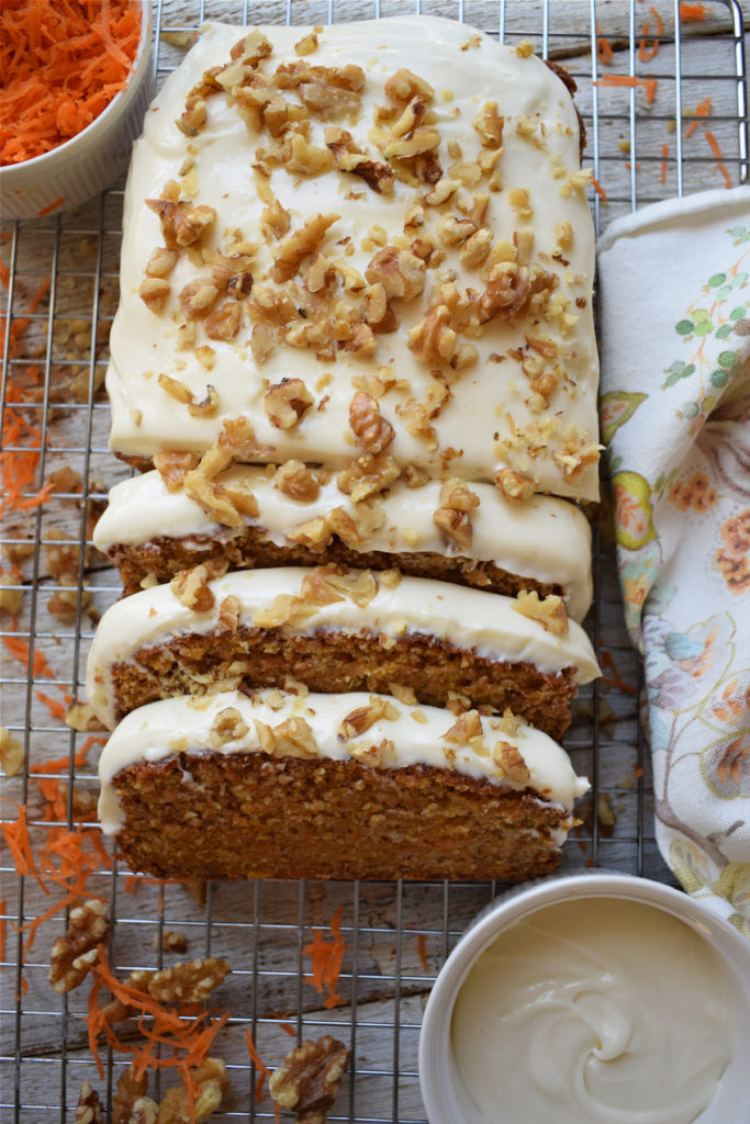 Cream Cheese Frosted Carrot Loaf Cake on a cooling rack.