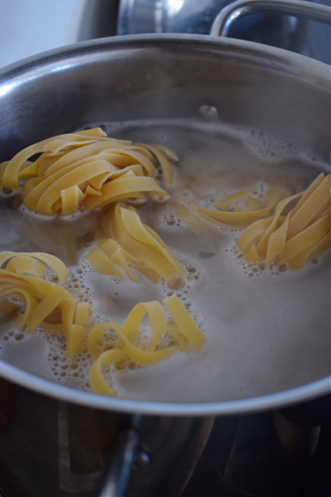 Cooking pasta for pasta primavera.
