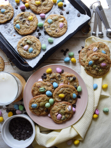 Easter cookie display on plates and a cookie tray.