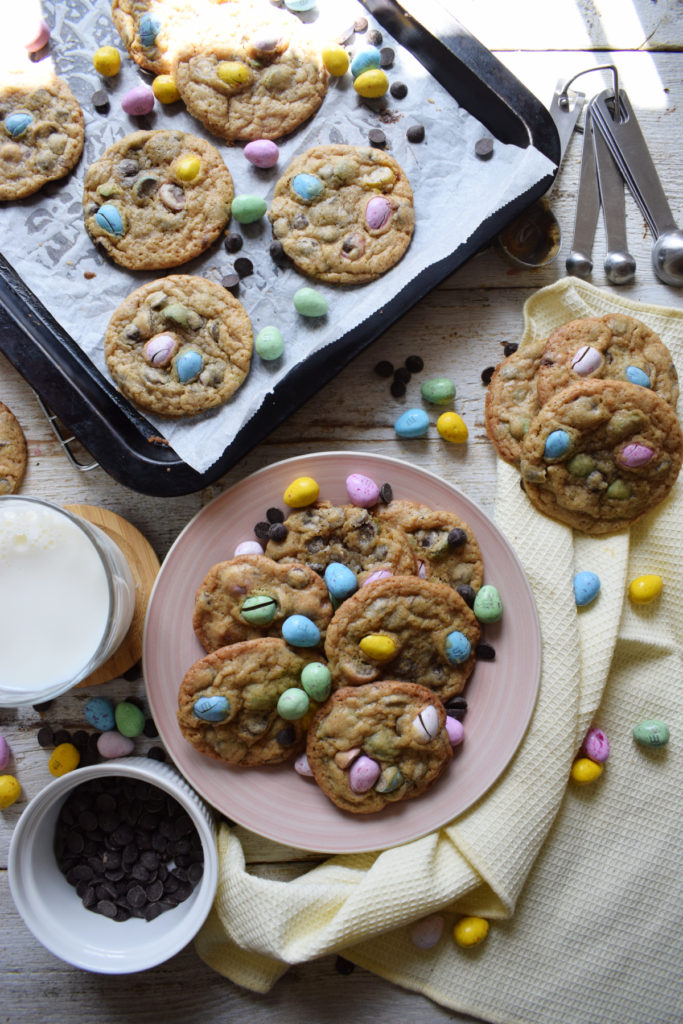 Easter cookie display on plates and a cookie tray.