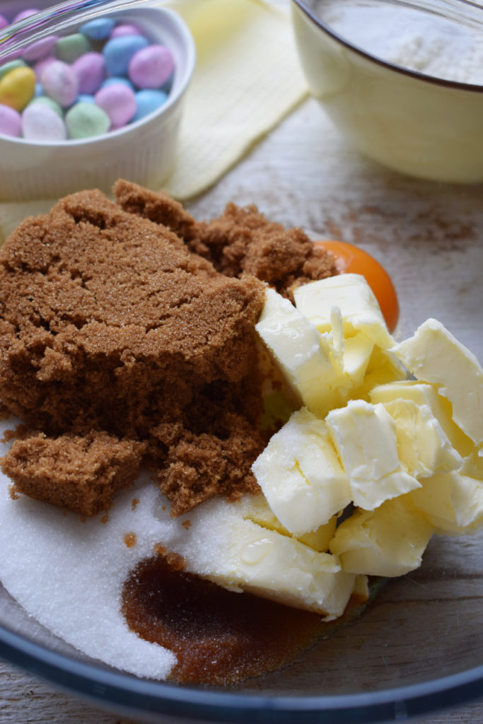 Mixing ingredients to make mini egg cookies