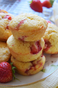 A stack of strawberry lemon muffins.