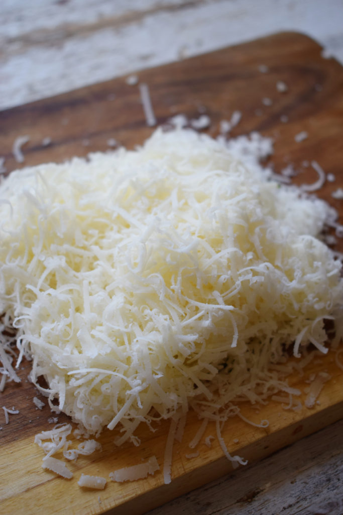  Finely grated parmesan cheese.