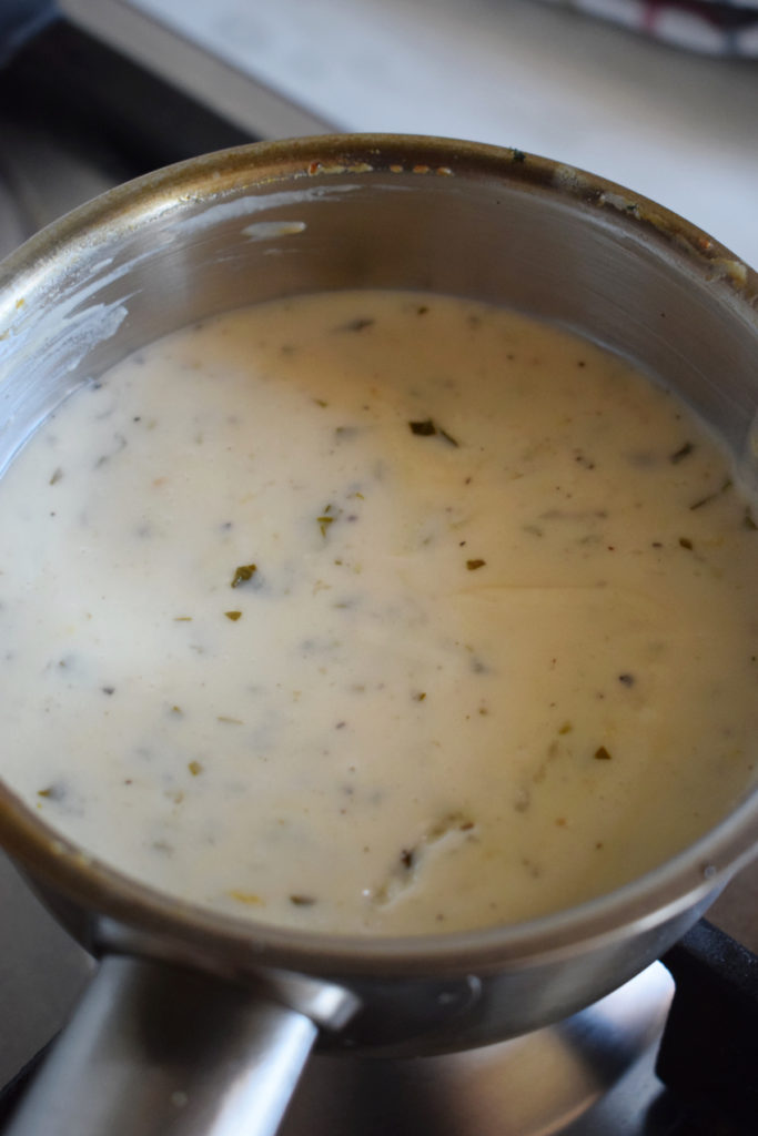 Lemon Basil Cream Sauce in a saucepan.