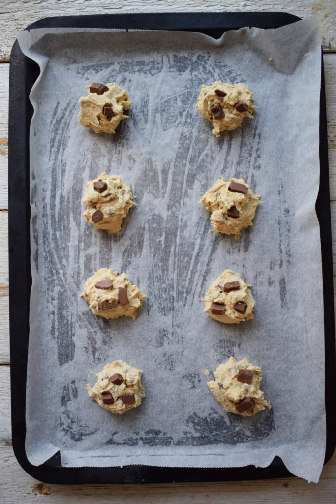 Cookie dough on a baking tray.