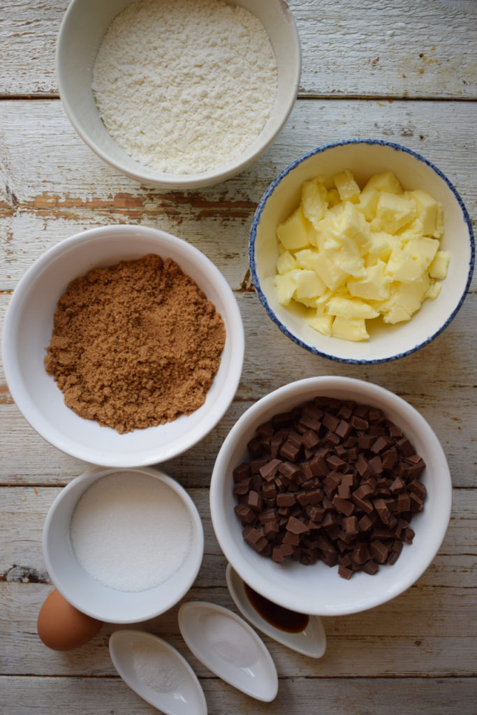 Ingredients to make milk chocolate chunk cookies.