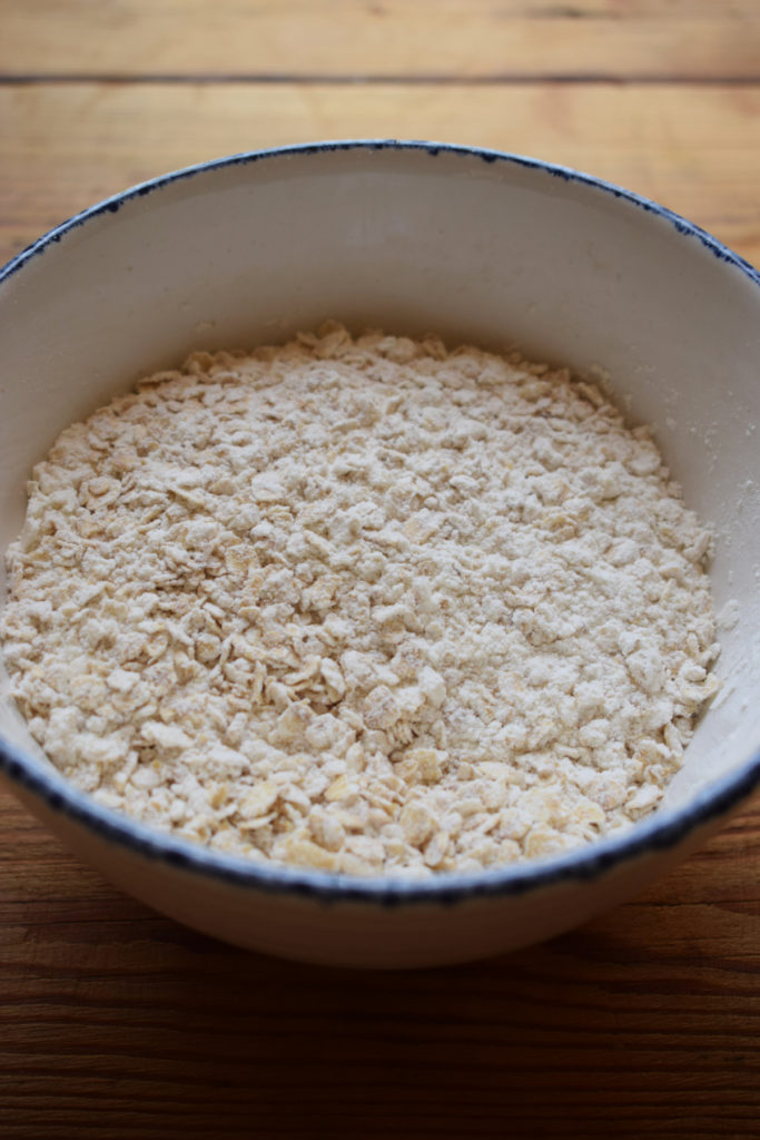 Oats and flour in a bowl.