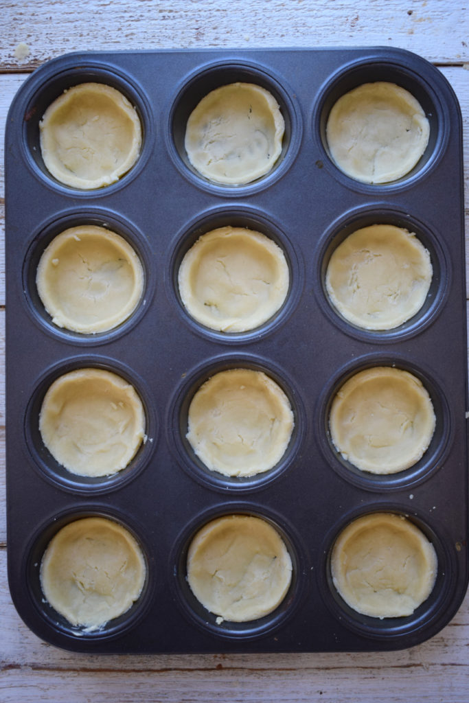 Pastry rounds in muffin tins.