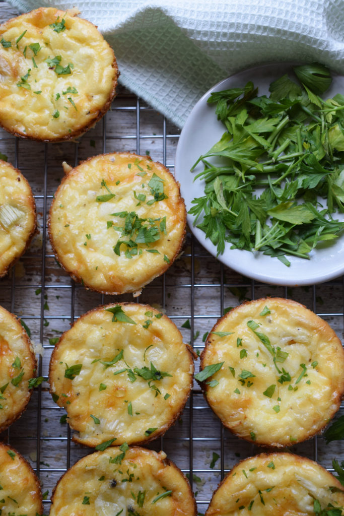 Mini quiche on a cooling rack.