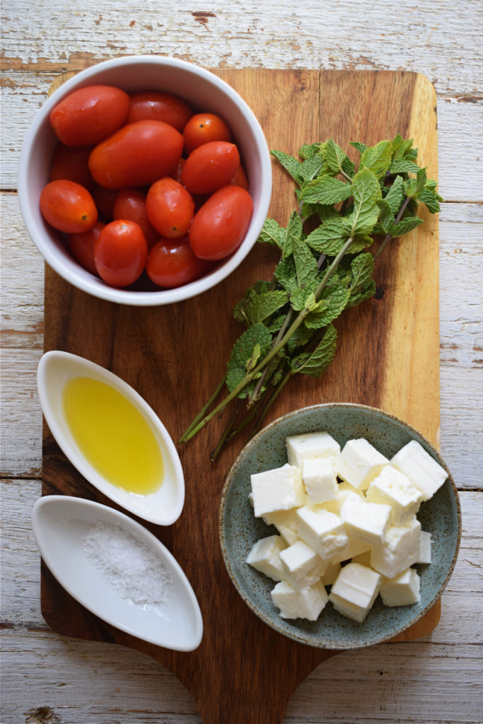 Ingredients to make tomato and feta bites.