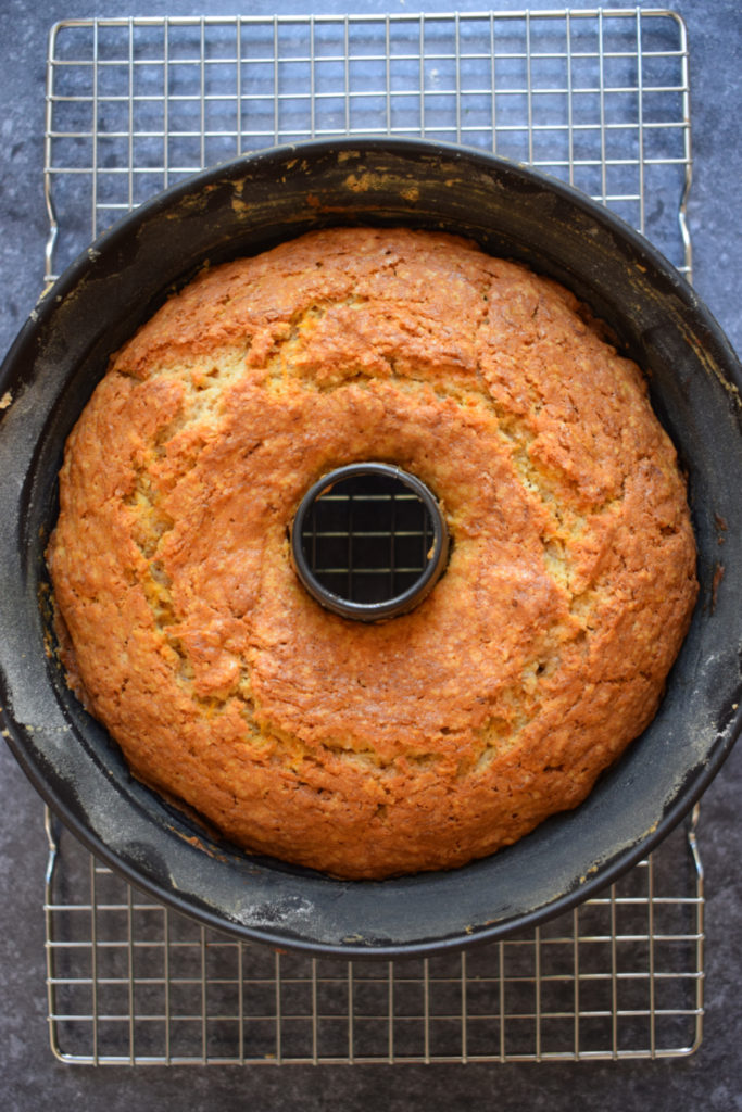 A baked carrot cake in a bundt pan.