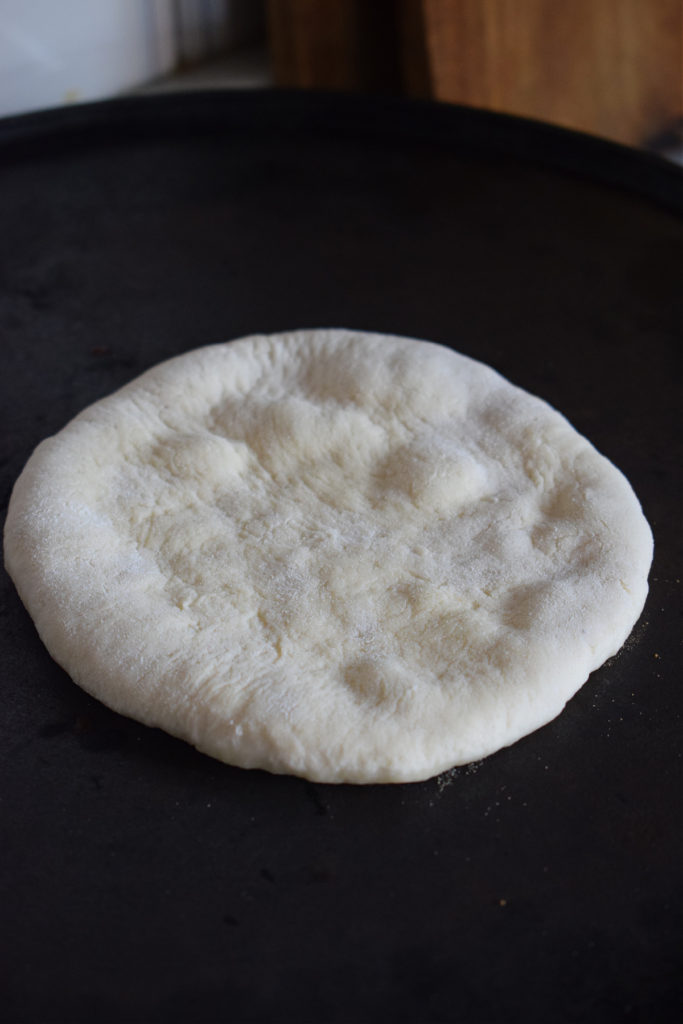 Cooking flatbread on the stovetop.