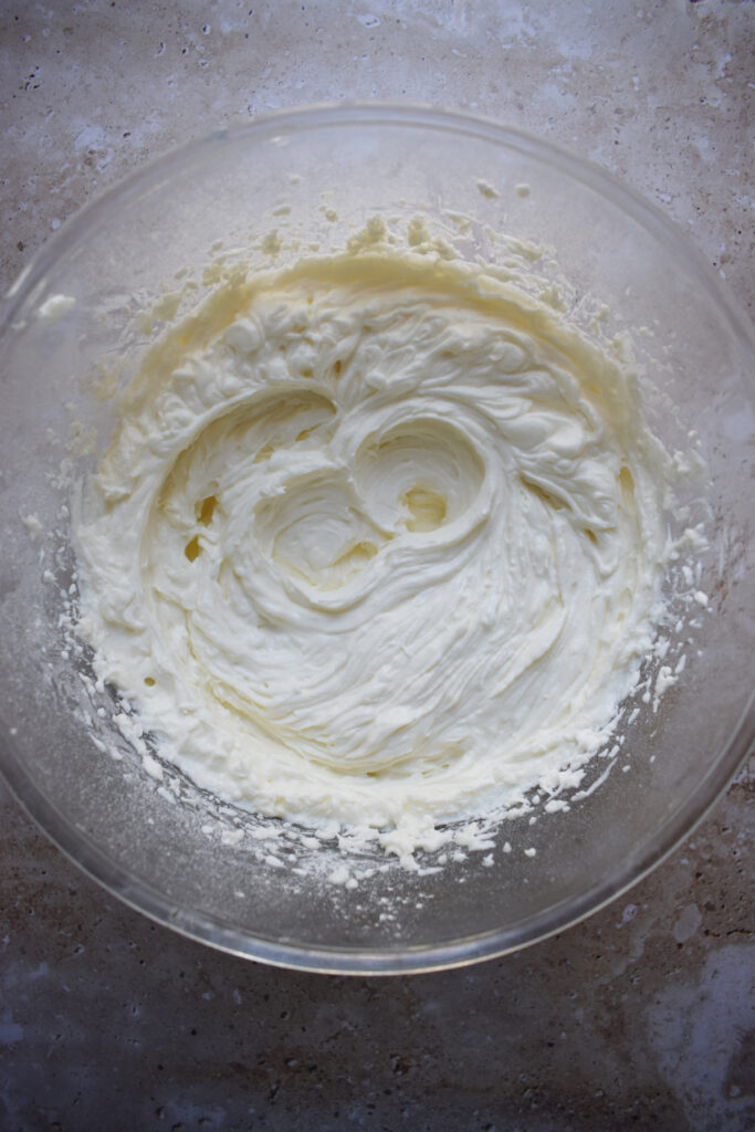 Whipped cream cheese filling in a bowl.