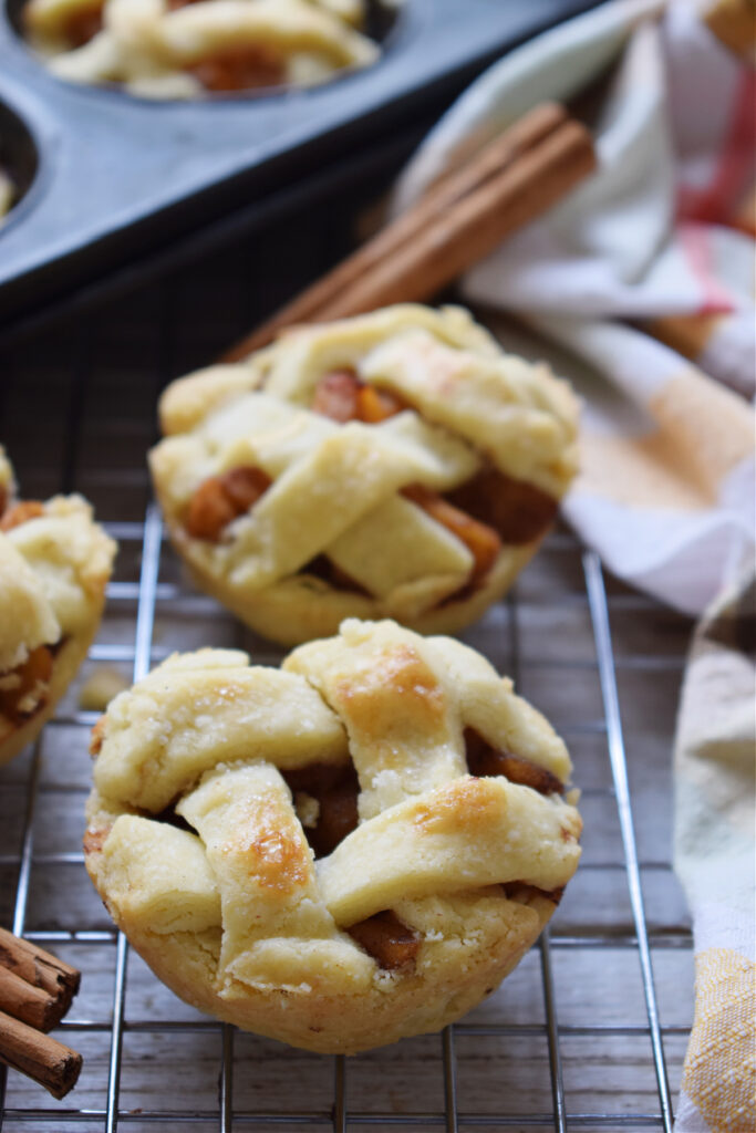 Mini apple pies with a lattice topping.