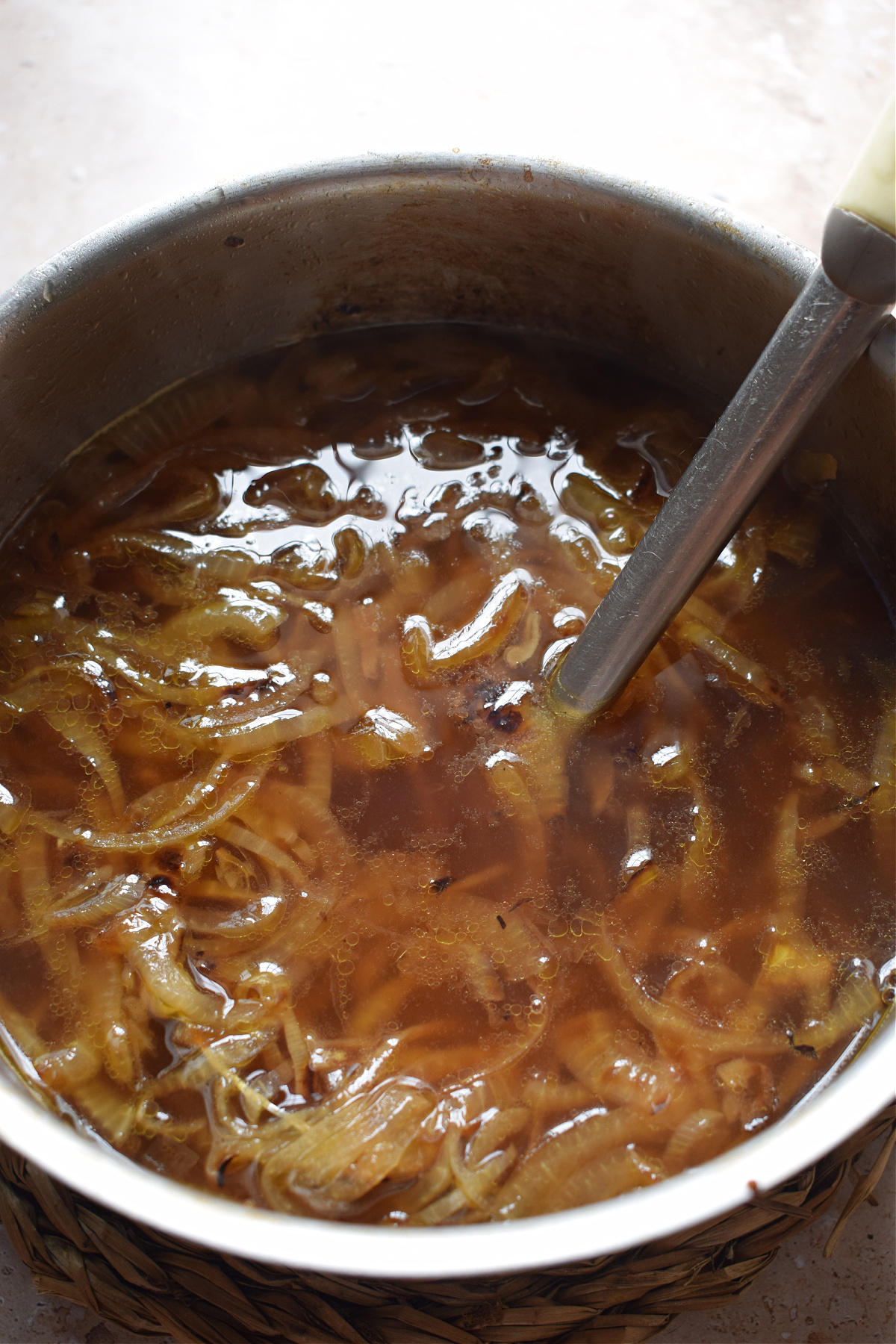 Caramelized onion in a saucepan.