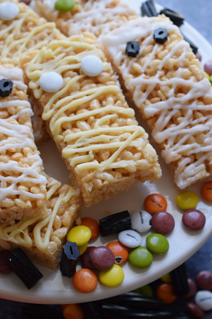 Rice krispie treats on a cookie tray.