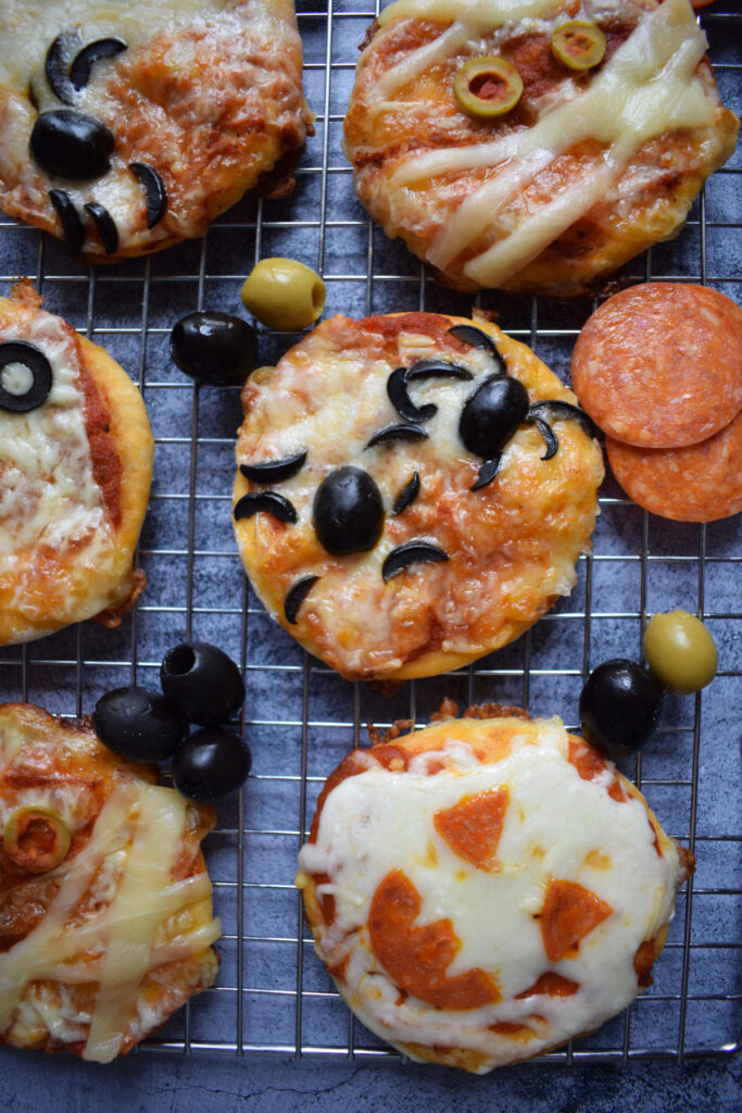 Close up of mini Halloween pizzas.